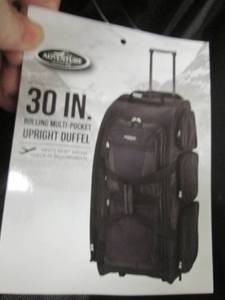 lot 9 image: Multi Pocket Upright Duffel by Trav...