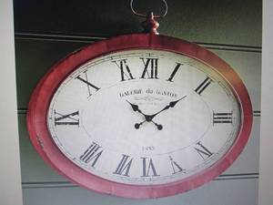 lot 52 image: Oval Wall Clock open box Retail $12...
