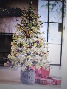 lot 56 image: 4-Ft. Prelit Tree with Trunk Pot op...