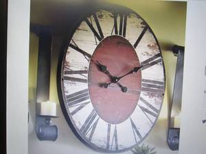 lot 125 image: Distressed Oval Clock open box Reta...