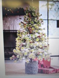 lot 139 image: 4-Ft. Prelit Tree with Trunk Pot op...
