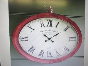 lot 261 image: Oval Wall Clock open box Retail $12...