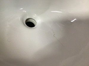 lot 23 image: Winslow 26 in. W x 22 in. D Bath Vanity in Antique White with Vanity Top in White Marble with White Basin - basin is damaged review pictures not used