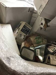 lot 32 image: Gaylord full of Assorted Plumbing  furnace filters,Bathroom Towel Bars, Toilet Paper Holders and more