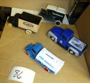 4 diecast truck banks, JI Case, New...