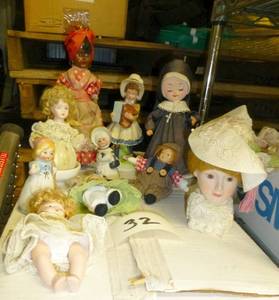 group of dolls, the nun and black l...