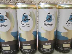 lot 217 image: 6 Cans of Caribou Coffee Vanilla Cr...