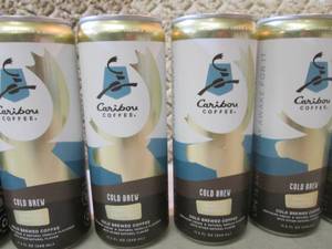 lot 220 image: 6 Cans of Caribou Coffee Vanilla Cr...