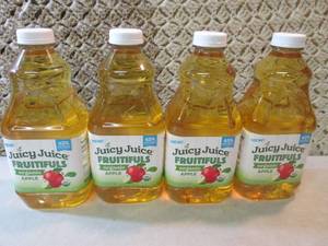 lot 264 image: 4 Bottles of Organic Apple Juice Be...