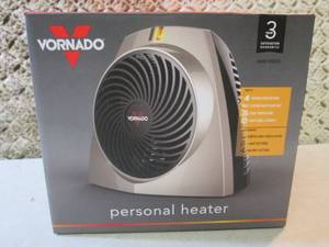lot 34 image: Vornado 1559 BTU 750-Watt Personal ...
