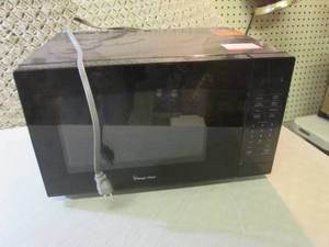 lot 97 image: Magic Chef Microwave Powers On  F-1...