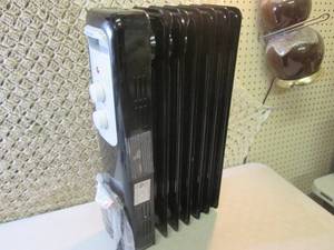 lot 110 image: Oil-Filled Radiant Heater Works but...