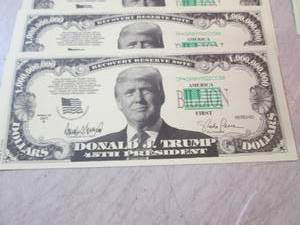lot 128 image: Lot of 10 Trump Billion Dollar Bill...