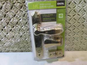 lot 136 image: Ideal Security Deluxe Storm Door Ha...