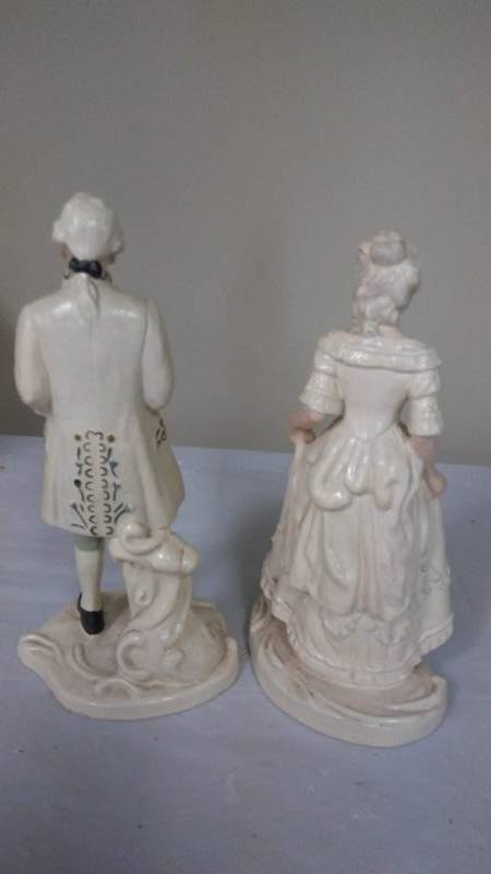 lot 13 image: Hand Painted Porcelain Victoria Statues from 1951