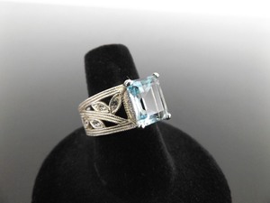 lot 48 image: .925 Sterling Silver Emerald Cut Topaz Crystal Ring Size 7
