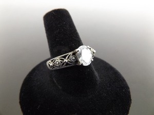 lot 67 image: .925 Sterling Silver Faceted Crystal Scrolled Ring Size 9.25