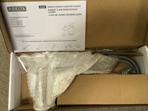 lot 114 image: Delta Modern Single Hole Single-Handle Bathroom Faucet in Chrome