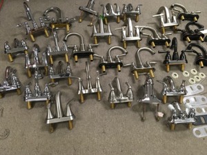 lot 133 image: Lot of assorted Moen Faucets some missing pieces condition varies review pictures