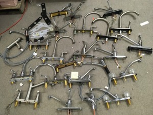 lot 134 image: Lot of Assorted Kitchen faucets some used or missing pieces please review pictures