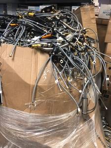 lot 137 image: Gaylord full of salvage branded faucets shower heads for parts or repair