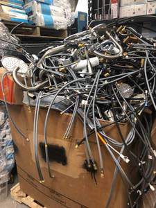 lot 138 image: Gaylord full of salvage branded faucets shower heads for parts or repair