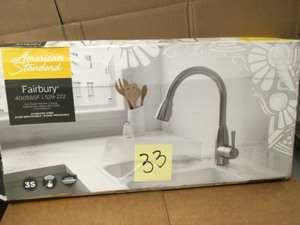 lot 33 image: American Std Fairbury Single-Handle Pull-Down Sprayer Kitchen Faucet in Stainless Steel