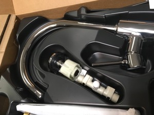 lot 65 image: Moen MOEN Sombra Single-Handle Standard Kitchen Faucet with Side Sprayer in Chrome 87702