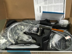 lot 83 image: MOEN Sombra Single-Handle Standard Kitchen Faucet with Side Sprayer in Chrome 87702