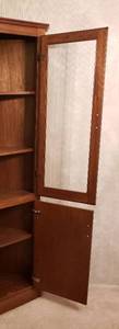 lot 18 image: Tall Glass Front Corner Cabinet