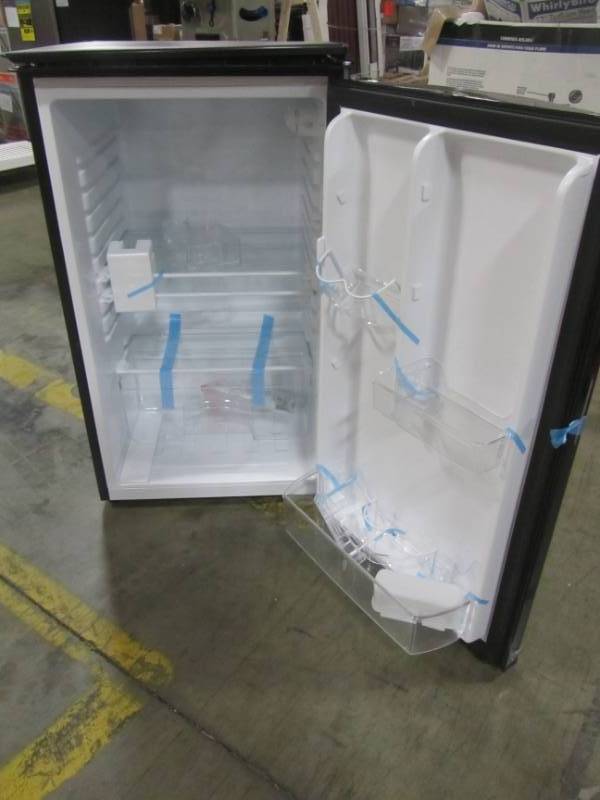 lot 56 image: Magic Chef Mini Fridge in Black HMAR440BE