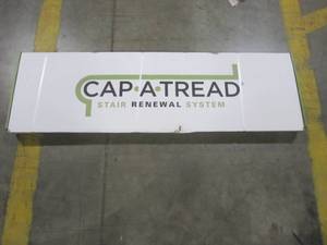 lot 34 image: Cap A Tread Stanhope Hickory 47 in. Length x 12-18 in. Deep x 1-1116 in. Height Laminate to Cover Stairs 1 in. Thick 016071874