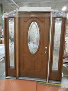 lot 210 image: ReliaBilt Hampton Oval Lite Decorative Glass Left-Hand Inswing Oak Stain, Stained Fiberglass Prehung Entry Door with Sidelights with Insulating Core