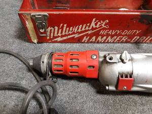 lot 5 image: Milwaukee Hammer Drill w Bits