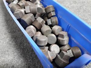 lot 32 image: 130 34 Black Pipe Plugs