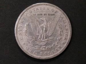 lot 6 image: 1879 Morgan Silver Dollar...