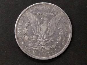 lot 24 image: 1889 O Morgan Silver Dollar...