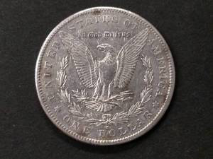lot 25 image: 1890 S Morgan Silver Dollar...