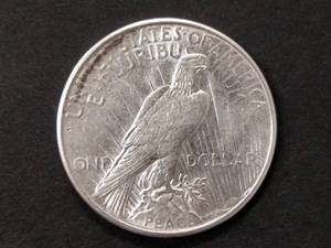 lot 83 image: 1925 AU Peace Silver Dollar...