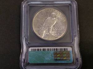 lot 89 image: 1928 ICG AU50 Peace Silver Dollar, ...