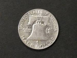 lot 117 image: 1957 D Franklin Silver Half Dollar...