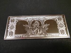 lot 174 image: 4 Ounce Silver Bar, Ten Dollar Biso...