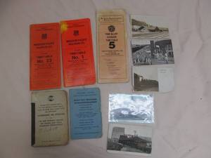 lot 7 image: vintage railroad rules, timetable books, vintage postcards
