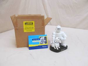 lot 77 image: Michelin man bobble head