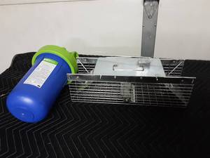 lot 11 image: Whole House Filter, New Hav-A-Hart Trap