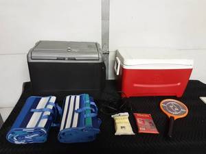 lot 21 image: 12 Volt Cooler, Igloo Cooler, 2-Beach Mats, 2-Ponchos, 1-Bug Zapper