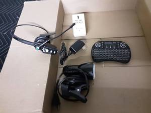 lot 44 image: Blue Parrot Brand Truck Head Set, Wireless Key Board Remote & More.