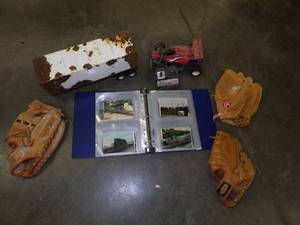 lot 44 image: Baseball Gloves, Binder with train pics, Vintage Toy and remote control car