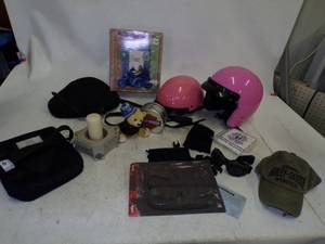 lot 40 image: Harley Davidson Gear with 2 Pink Helmets, Hat, Tin and much more