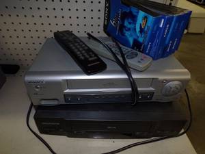lot 19 image: Pair of VCR Players with VHS Tapes